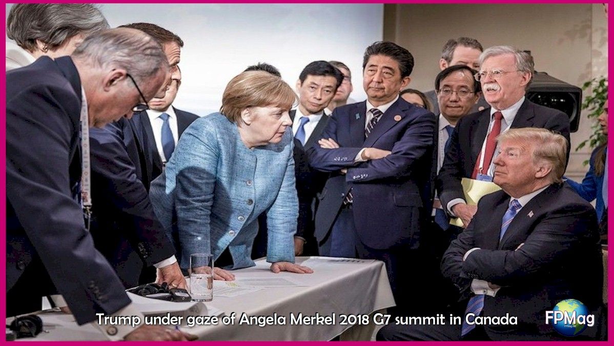 Trump under gaze of Angela Merkel -- Day two of the G7 summit in Canada: spontaneous meeting between two working sessions. # G7Charlevoix # g7 # with #multilateralism #multilateralism