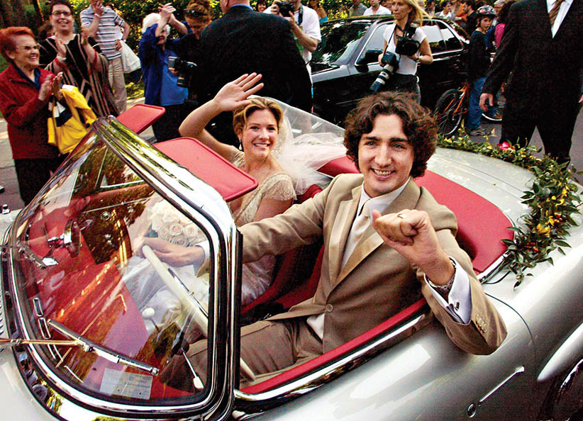 Justin and his wife in Pierre's Car on their wedding day