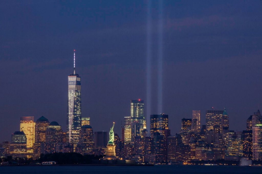 The Tribute in Light on September 11, 2014, on the thirteenth anniversary of the attacks, seen from Bayonne, New Jersey. The tallest building in the picture is the new One World Trade Center.
