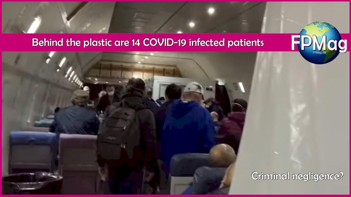 Behind the plastic are 14 COVID-19 infected patients