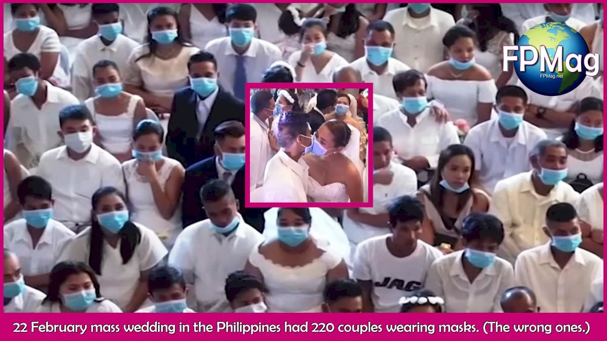 Taking things in stride, 220 Filipino couples marry wearing surgical masks.